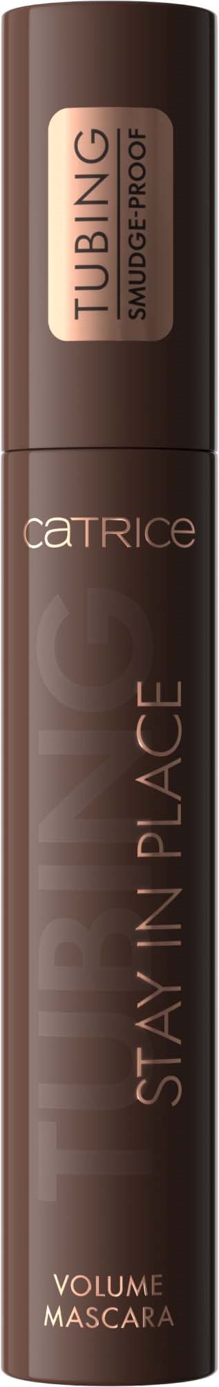En brun tube mascara med "STAY IN PLACE" skrevet vertikalt og en etikett som sier "TUBING SMUDGE PROOF".