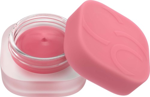 A small pink jar with a matching pink lid, containing a cream or lotion.