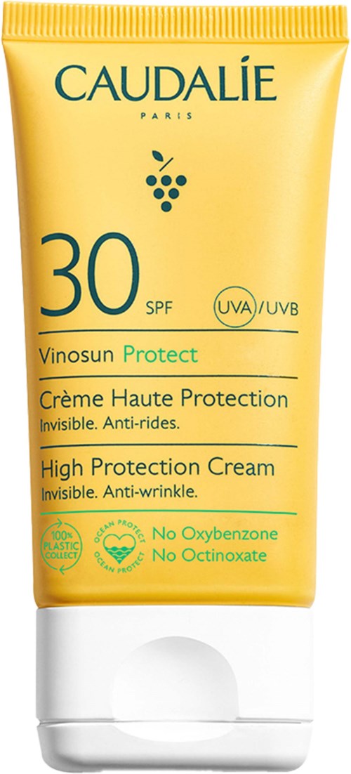 Gul tub med blå och gröna texten för hudskydd, SPF 30, står 'Vinosun Protect' och 'High Protection Cream.'