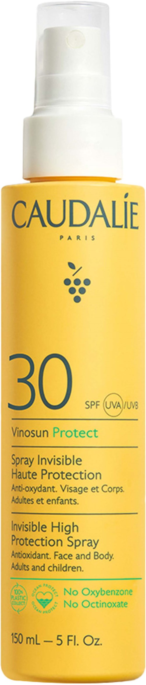 En gul flaska med Caudalie solskyddsspray med SPF 30, märkt för ansikte och kropp, för vuxna och barn.