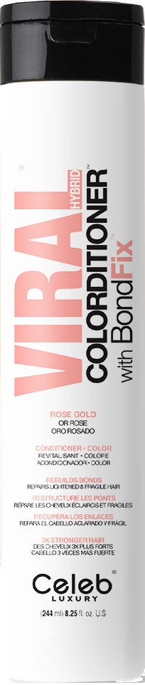 En lång cylindrisk flaska med svart lock, märkt WIRAL Color Conditioner, från Celeb Luxury, med rosa och svart text.