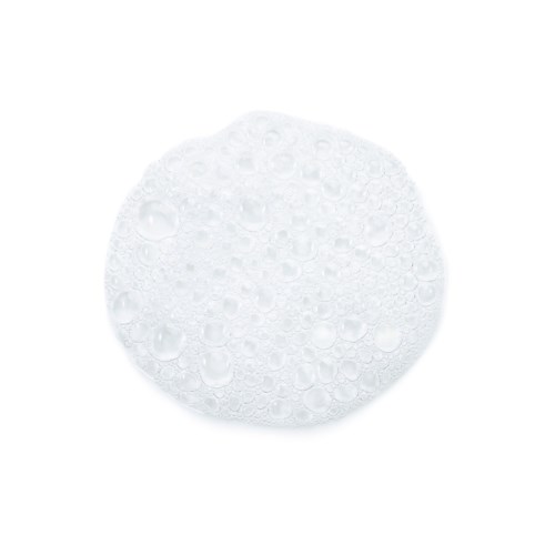Een ronde zeep met veel bellen op het oppervlak.