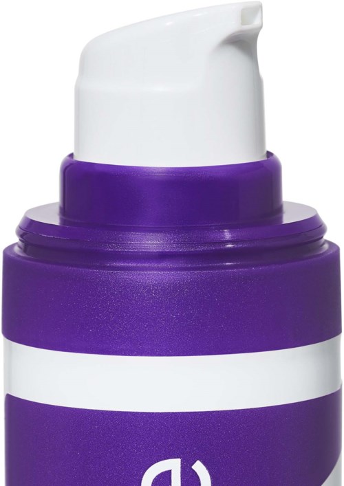 Lila flaska med vit pump och vit rand, troligtvis för lotion eller flytande tvål.