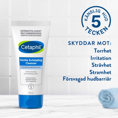 Skonsam exfolierande rengöringsmedel för torr, fet och blandad hud, med 5 hudskyddstecken, i ett vitt tub.