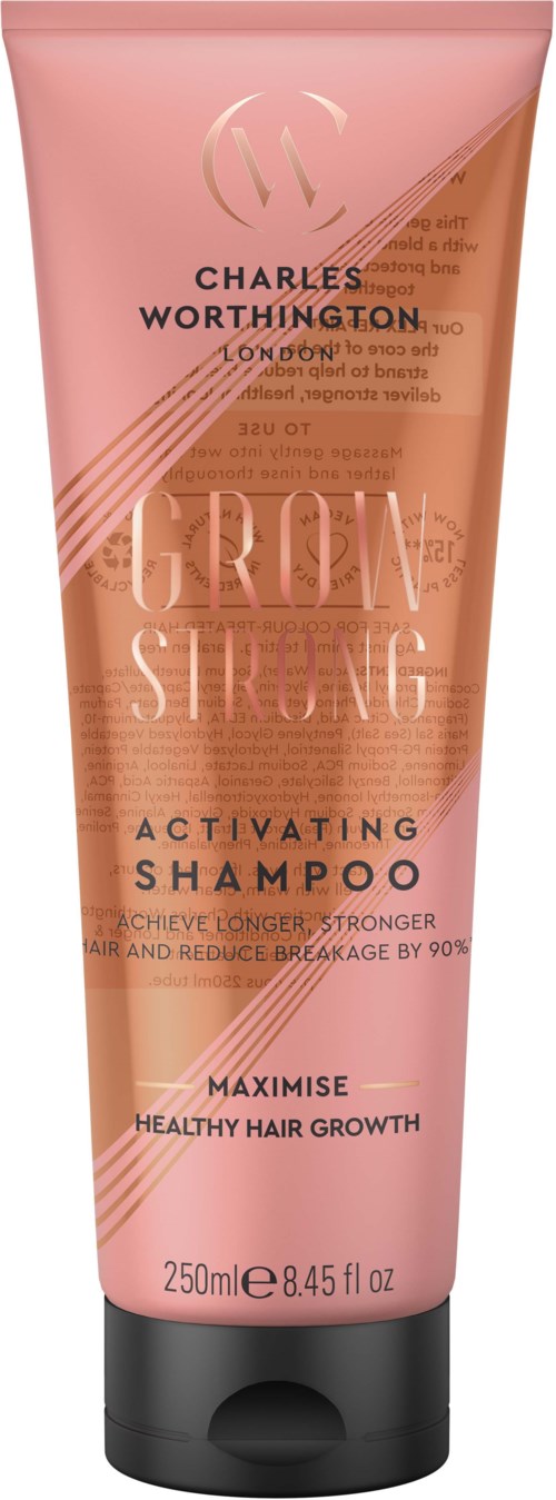Eine rosa-braune Flasche von Charles Worthington Grow and Strength aktivierendes Shampoo für gesundes Haarwachstum.