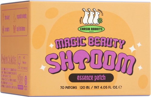 En pakke hudklistermærker kaldet 'Magic Beauty Shroom' med gul boks, lilla tekst og kaninlogo.