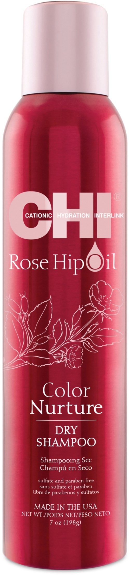 Rosa flaska torrschampo med vitt och rosa etikett med blommönster och produktinformation.