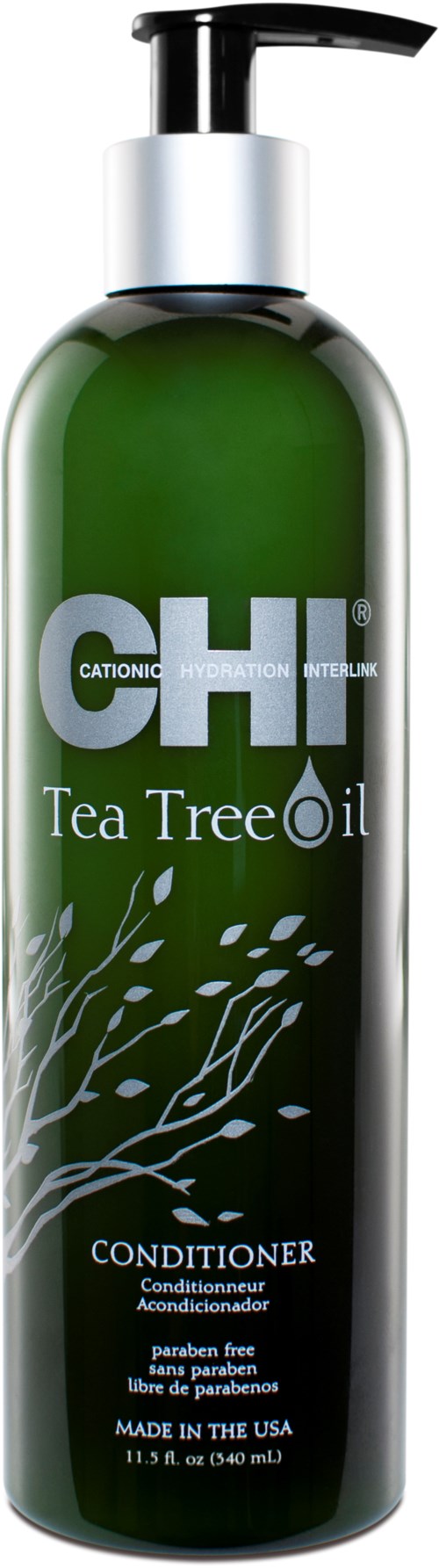 Grön flaska märkt 'Tea Tree Oil' med pump, för hårvård. Tillverkad i USA.