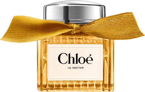Chloé Le Nectar Parfümflasche mit silberner Kappe und gelbem Band um den Hals.