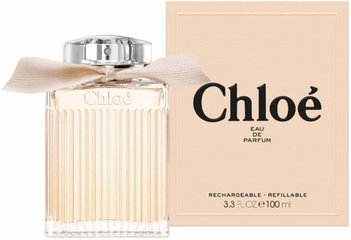 A perfume bottle with a soft bow on top and a beige box labeled 'Chloé Eau de Parfum'.
