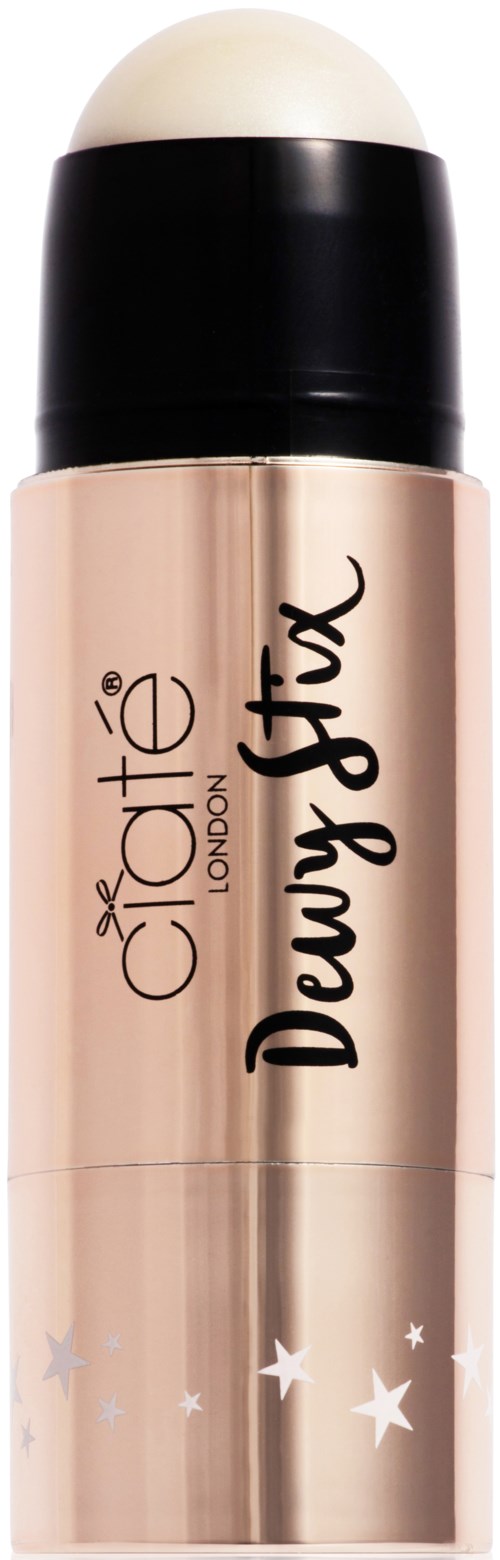 En flaska Clinique Dewy Stix med svart lock, beige kropp och stjärndesigner nedtill.