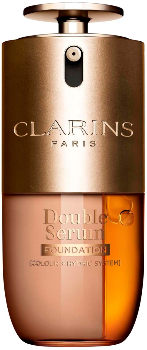 En flaska Clarins Paris Double Serum Foundation med metallock och bärnstensfärgad botten.