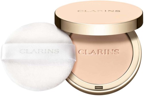 A compact with pink powder, mirror, and a white applicator puff labeled 'Clarins' on a light background.