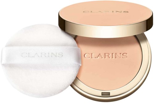 A round blush compact with a matching puff and a beige lid labeled Clarins.