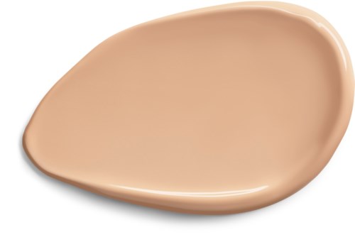 A beige, teardrop-shaped makeup foundation or concealer swatch on a white background.