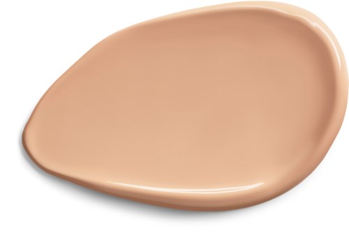 A beige cosmetic product, smooth and slightly curved, with a shiny surface, resembles foundation or concealer.