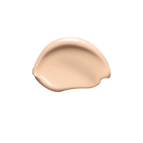 A small drop of beige liquid with smooth edges, on a white background.