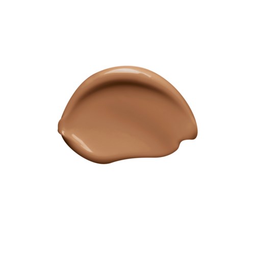 A blob of light brown liquid or cream on a white background.