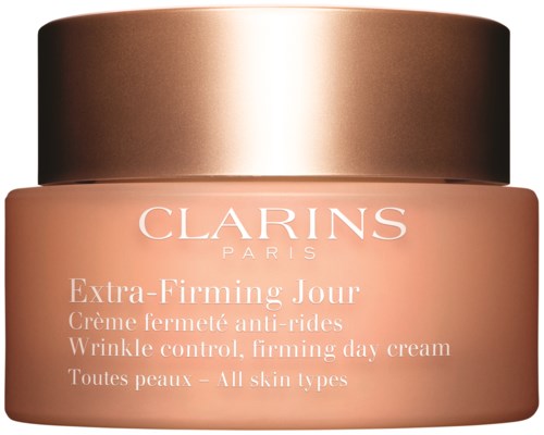 En burk med Clarins Extra-Firming Day Cream för alla hudtyper med ett brunt lock och etikett.