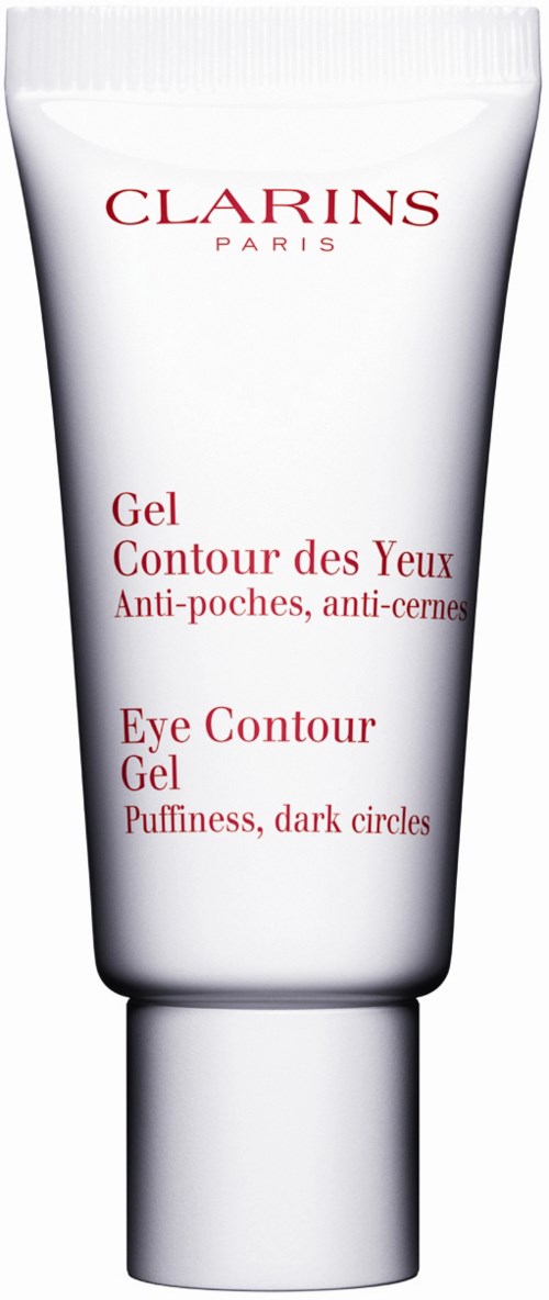 En vit tub med Clarins ögon gel med röd text, avsedd att minska svullnad och mörka ringar runt ögonen.