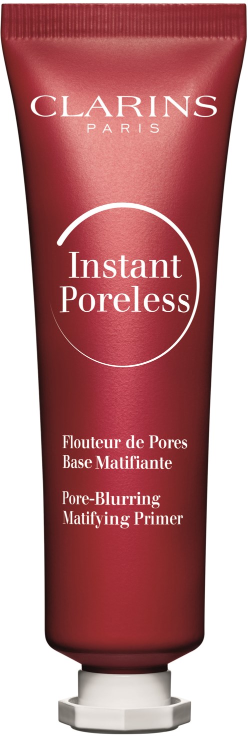 Rødt rør merket 'Clarins Paris' med 'Instant Poreless' og fransk tekst for pore-forstørrelsesgrunning.
