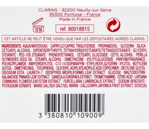 En etikett med ingredienser listade i röd och svart text, streckkod längst ner och en återvinningssymbol. Innehåller fransk text.