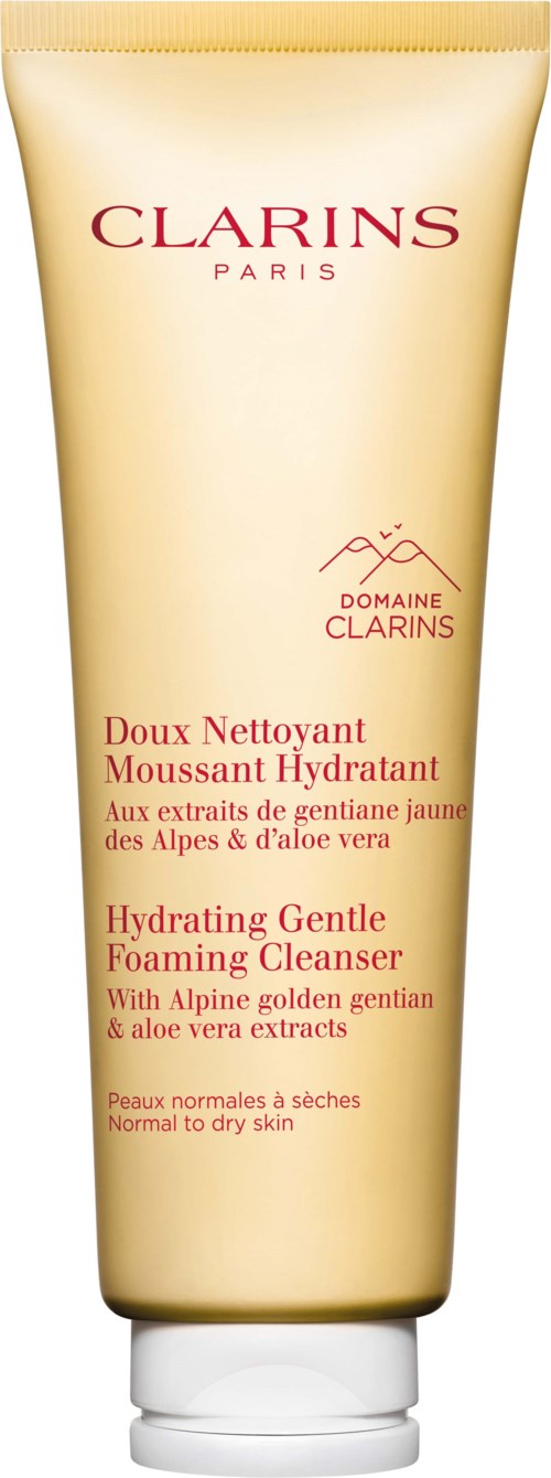 A beige tube of Clarins hydrating foaming cleanser with red and orange text describing ingredients.