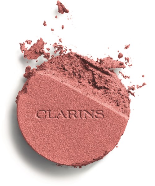 Pyöreä vaaleanpunainen poskipuna, jossa on Clarins-merkki ja hieman puuteria ympärillä.