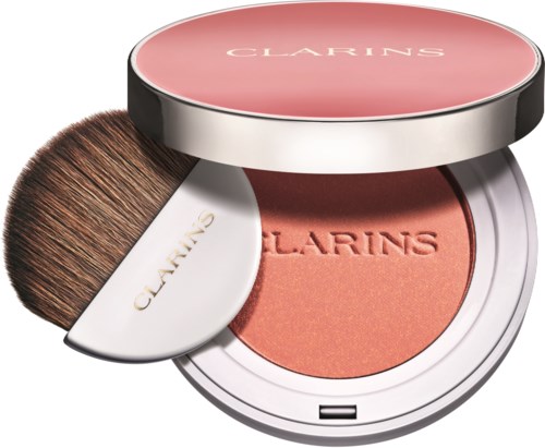 Kompakt różowy z pędzlem, marka Clarins, zawiera różowy puder.