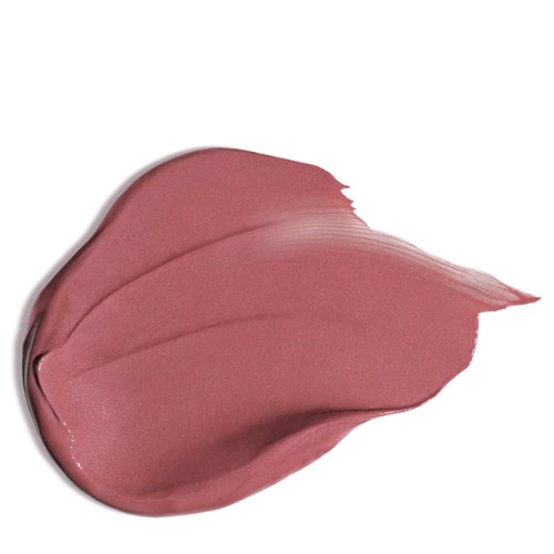 Et tykt lag av rosa leppestift eller makeupprodukt med myke streker.