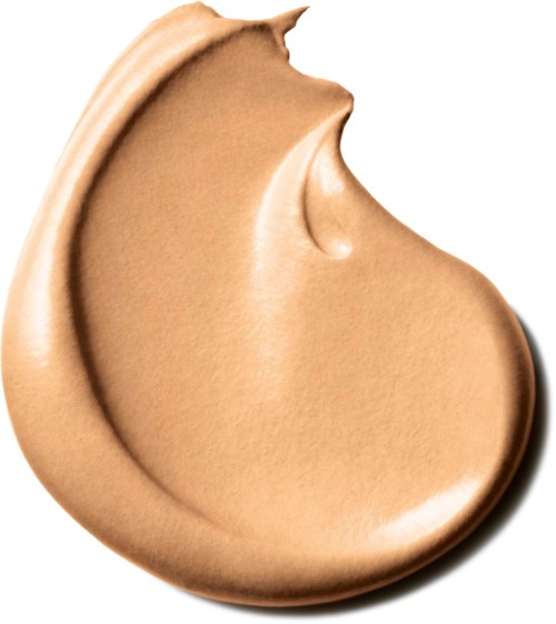 Creamy beige face foundation with a smooth, shiny texture and a slight curve. It appears to be a cosmetic product.