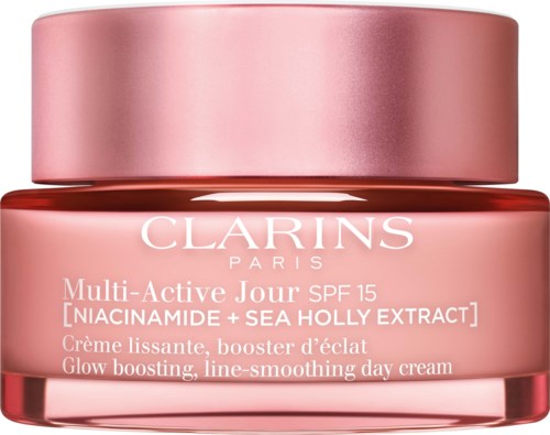 Pink krämkruka med Clarins och SPF 15, niacinamide och sjöhollyextrakt, för att ljusa och jämna huden.