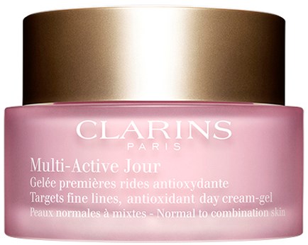 En rosa kräm burk med guldlock, märkt Clarins Multi-Active Day för normal till blandhy.