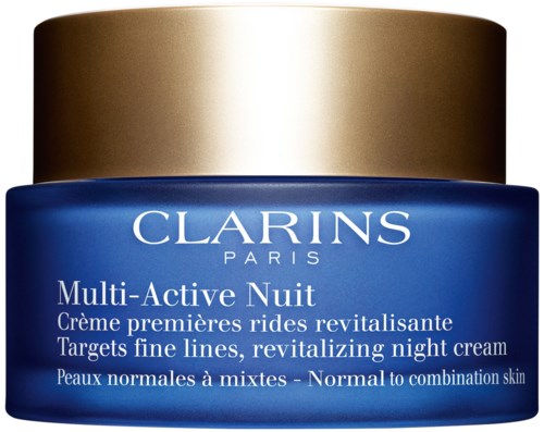 En blå krukke med Clarins Multi-Active Nuit nattkrem med gullhette.