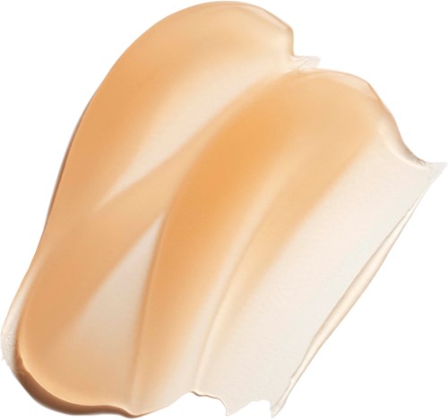A dollop of beige-colored cream or sauce with a smooth, wavy texture.