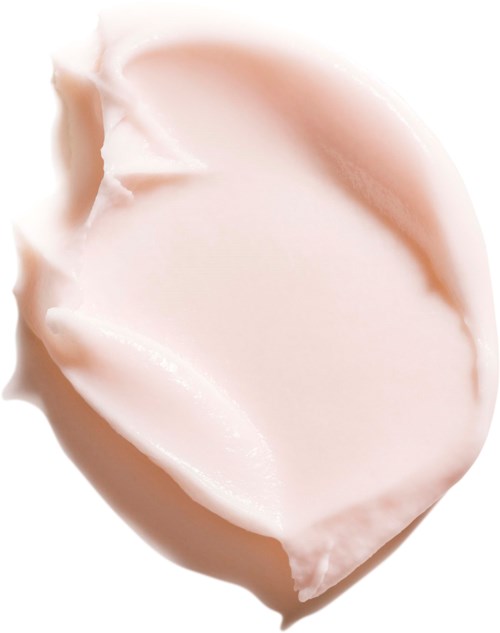 Lähikuva palmankokoisesta, vaaleasta saippuasta, joka on sileä ja pehmeästi muotoiltu.