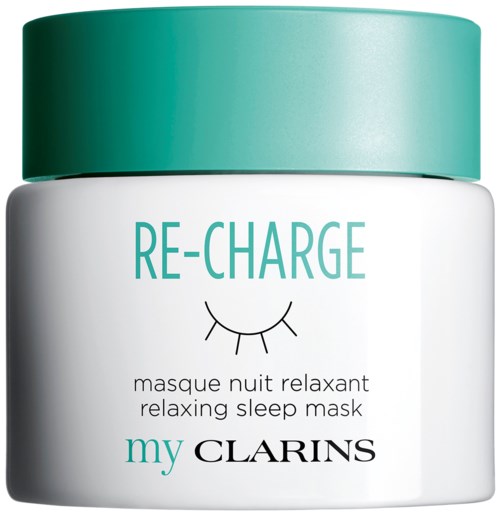 En burk med avslappnande sömnpåse kallad Re-Charge av Clarins med ett grönt lock och vit behållare.