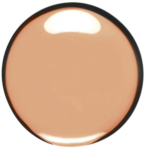 Ein runder Compact-Spiegel mit beige Puder Make-up darin.