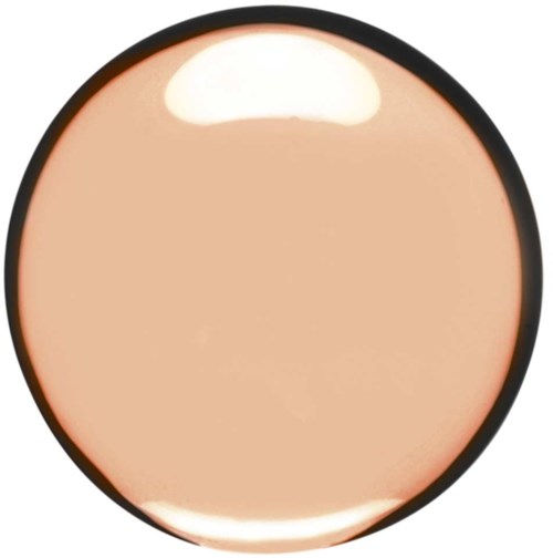 En rund makeupsvamp med beige färg och svart kant som visar. Den ser mjuk och slät ut.