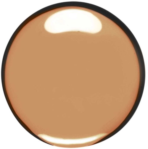 Pyöreä meikkauskulho, jossa beige meikkivoide ja musta kehys.