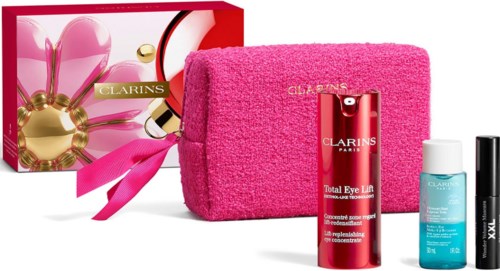 Zestaw kosmetyków Clarins w różowej torbie, zawiera krem, serum i lifting do oczu.
