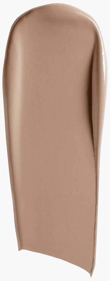 En beige, förlängd makeup- eller hudvårdsrör med lock.