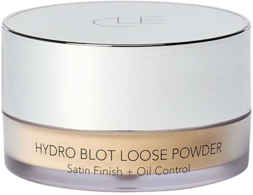Kosmetiktiegel mit der Aufschrift "Hydro Blot Loose Powder" in Satin-Finish, Ölkontrolle und elegantem, weißem Design.