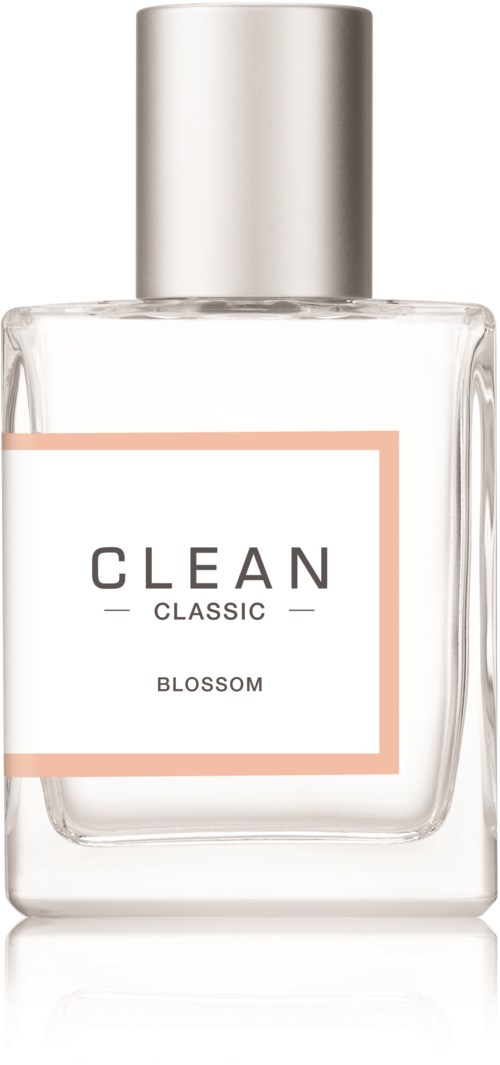 En tydlig parfyllank med silverkapsel, märkt "CLEAN CLASSIC BLOSSOM" i enkel svart text, minimalistisk design.