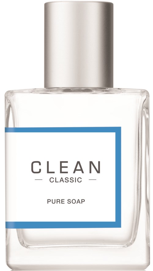 En tydlig tvålkopp med vit etikett som säger "CLEAN CLASSIC PURE SOAP" och ett silverlock.