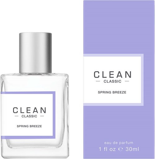 En parfyllflaska och låda märkt 'CLEAN CLASSIC SPRING BREEZE' i lila och vitt med en silverkork.