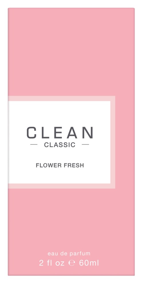 En rosa och vit parfymkartong med orden "CLEAN CLASSIC FLOWER FRESH" på.