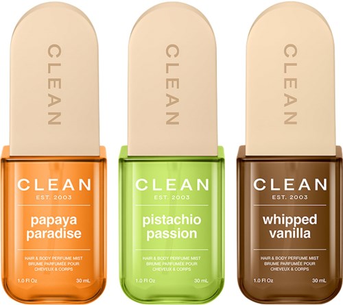 Tre flasker hår- og kroppsspray fra merket Clean med dufter av papaya paradise, pistachio passion og whipped vanilla.