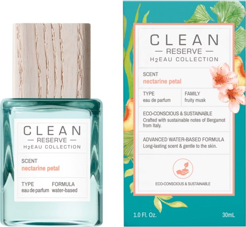 En parfyllåda och flaska märkt 'CLEAN RESERVE' med doft 'nectarine petal', med blom- och fruktmönster.