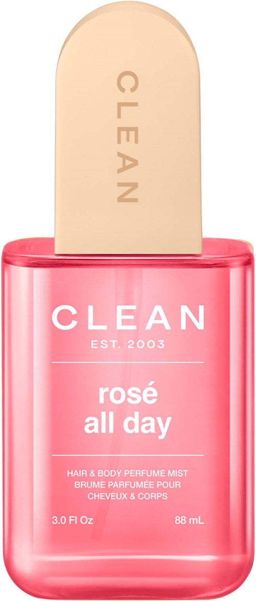 Różowa butelka perfum do włosów i ciała o nazwie Clean Rosé All Day, z beżową dyszą.